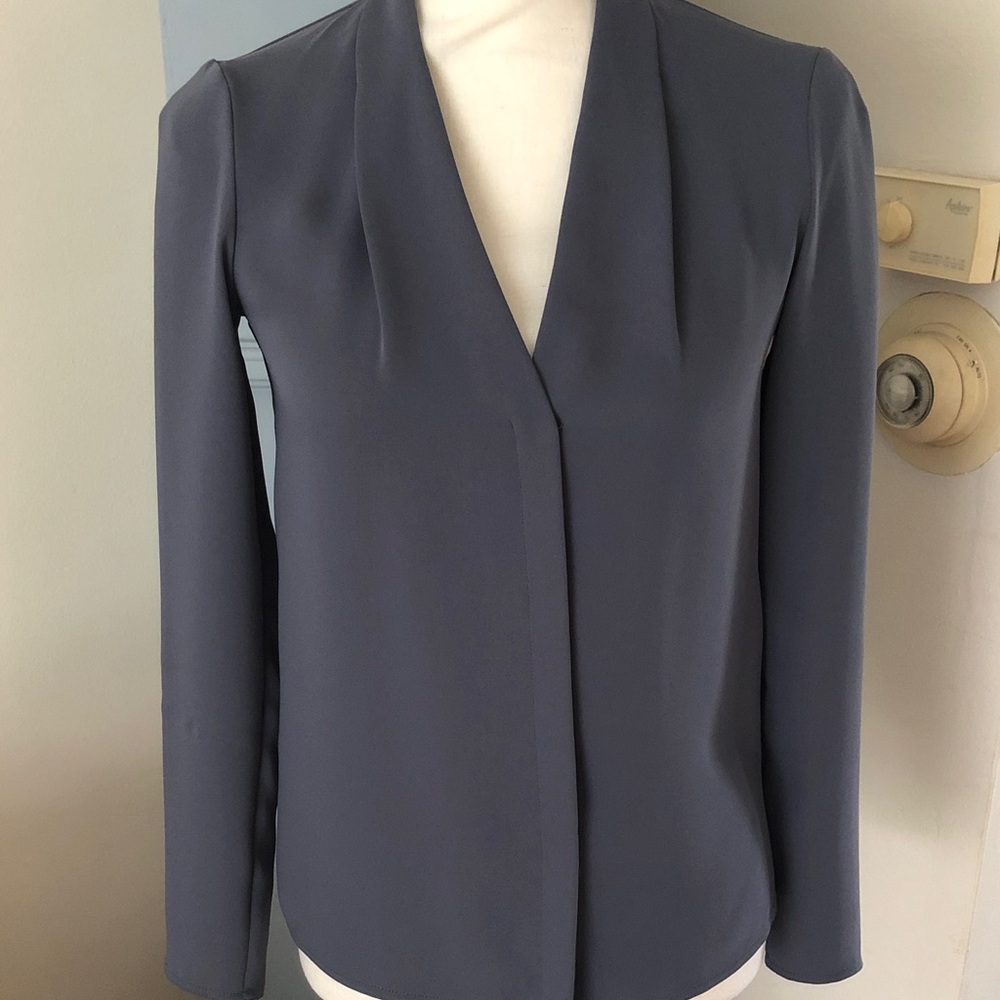 Babaton dark teal button up blouse. Photo appears more navy